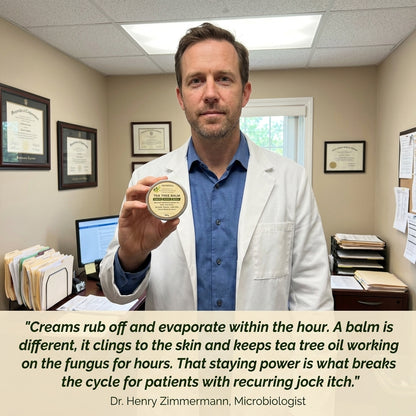Man holding NAIA IronBark Tea Tree Balm, a natural remedy for fungal infection and skin restoration.