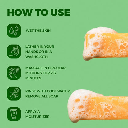 NAIA Turmeric Fade & Glow Bar soap with bright yellow turmeric-infused formula and natural ingredients, shown in a close-up image.